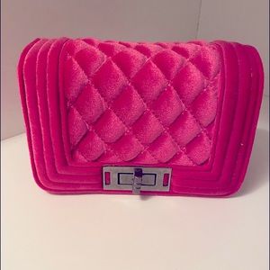 Pink mini Sergio Feretti purse.